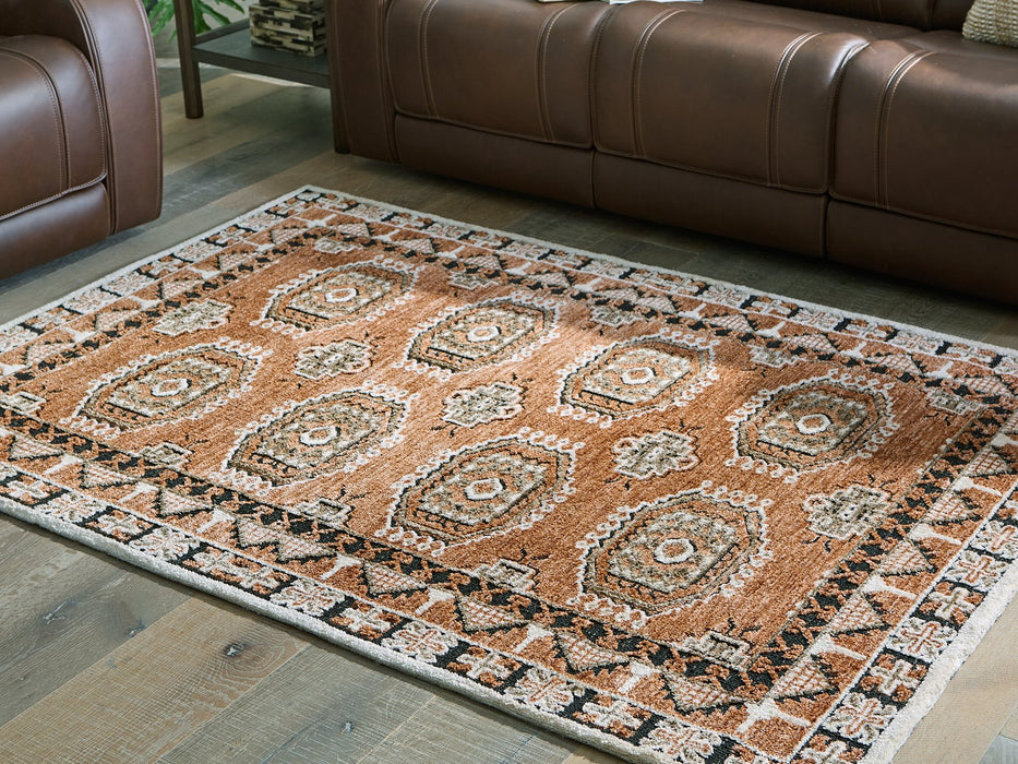 Qaabiz Area Rug